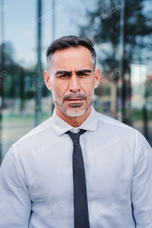 Preview: Confident Man in Shirt and Tie near Building