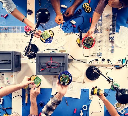 Preview: Technician team working at electronics repair shop