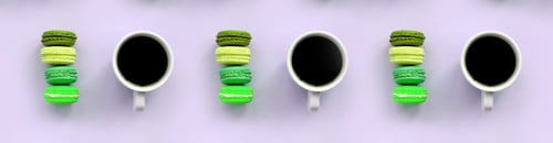 Preview: A pattern of many colorful dessert cake macaroon and coffee cups on tre