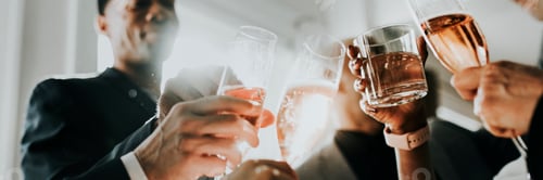 Preview: Team celebrating with champagne