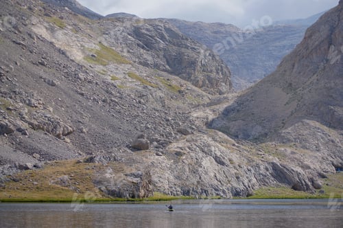Preview: Tiny human in a boat