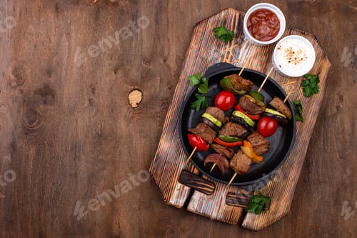 Preview: Grilled kebabs with meat, mushrooms and vegetables