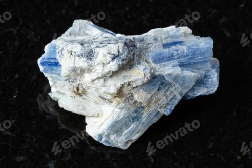 Preview: sample of unworked kyanite mineral on black