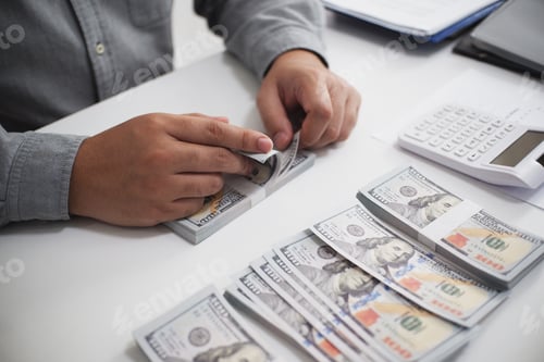 Preview: Unrecognisable businessman, accountant, banker counting money at the workplace, white background