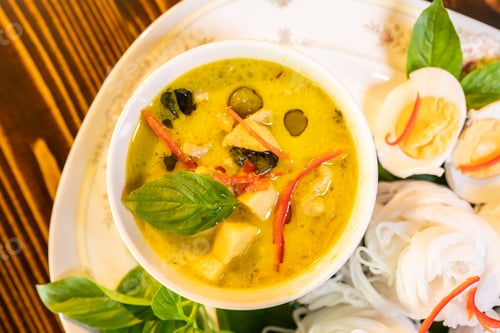 Preview: Thai style food, green curry with chicken, delicious vegetable Asian dinner