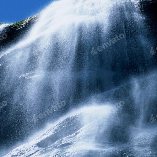 Preview: Majestic waterfall cascade with mist