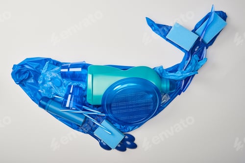 Preview: top view of whale made from disposable plastic tableware, bag, bottle, sponges and rubber gloves