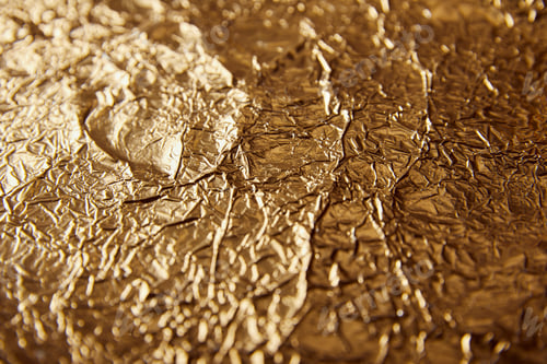Preview: sheet golden foil with blurred bright glares