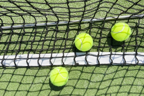 Preview: close up of a padel and tennis court with artificial grass and balls
