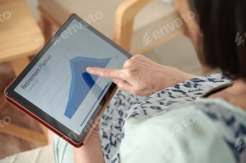 Preview: Senior Woman Examining Retirement Plan