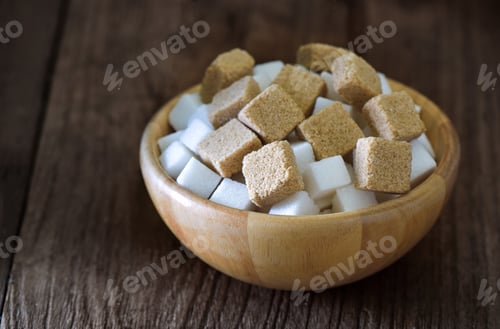Preview: Sugar cubes in wood bowl on wood table