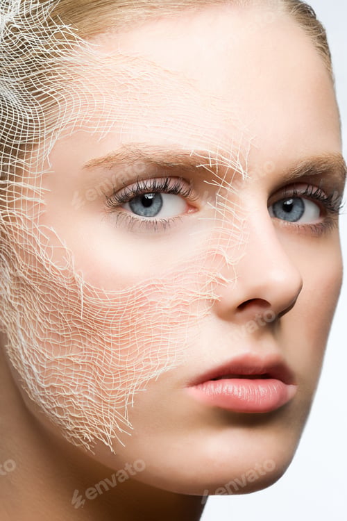 Preview: Woman with gauze on face