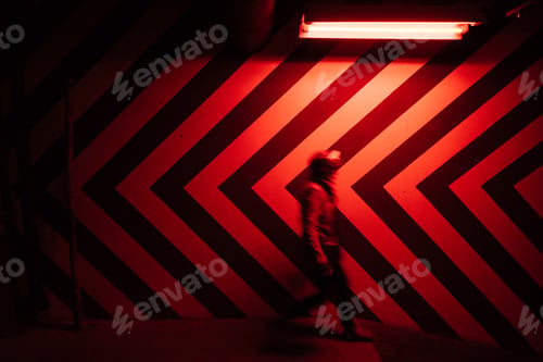 Preview: Blurred man figure on underground walkway