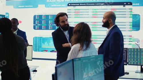Preview: Staff members from a business enterprise discussing details and progress