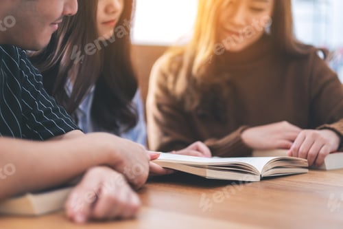 Preview: Group of young people enjoyed reading the same book together