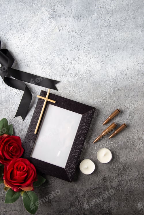 Preview: top view of picture frame with red flowers on white background death soldiers tank war
