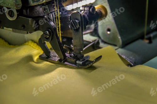 Preview: Professional overlock sewing machine with yellow fabric