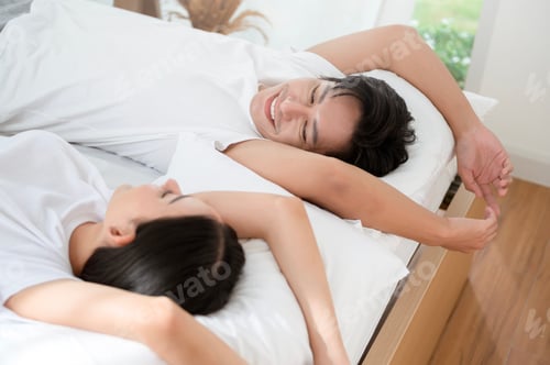 Preview: Couple Enjoying a Tender Moment Indoors in a Bright and Airy Space While Sharing Smiles
