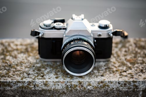 Preview: Old retro camera on the stone