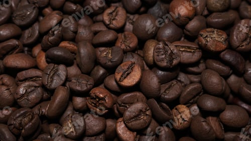 Preview: Closeup shot of the heap of brown coffee beans
