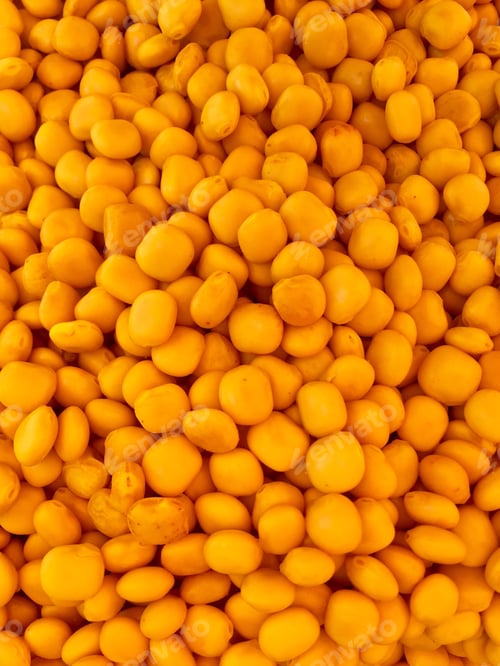 Pile of Fresh Yellow Fruit or Candies