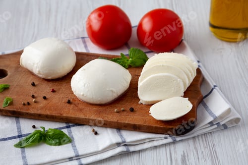 Preview: Homemade Mozzarella Cheese with Tomato, Basil and Olive Oil, low angle view.