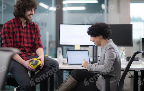 Preview: software developers couple writing programming code