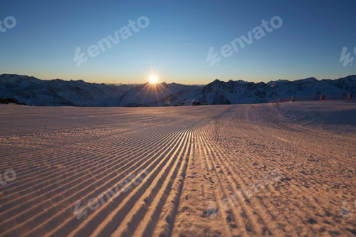 Preview: Sunrise over a pristine snowy landscape