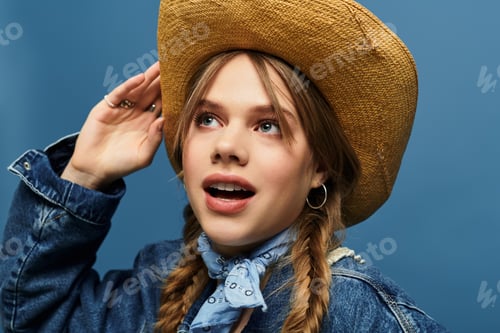 Preview: Youthful expression captured in a studio with stylish denim jacket and spring vibes