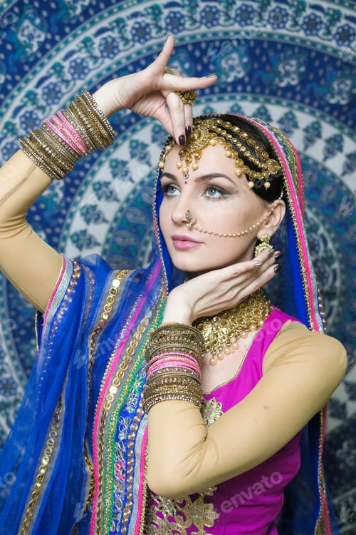 Preview: Woman In Indian Clothes Dancing Belly Dance. Young Beautiful Woman In National Costume Dancing