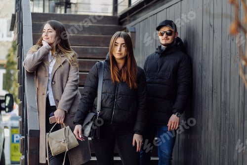 Preview: Three young models are walking around the city
