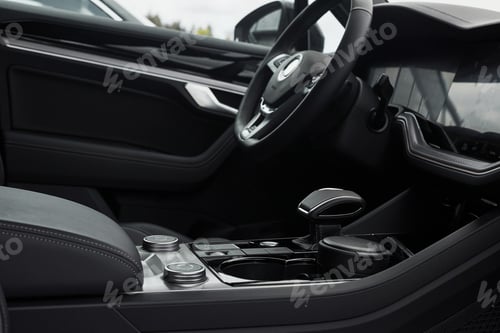 Preview: Interior of a prestigious modern black car. Leather comfortable seats and accessories and steering