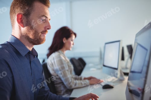 Preview: Mature student using computer