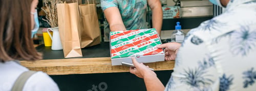 Preview: Couple picking up take away food order