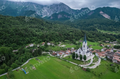 Preview: Drežnica village, Slovenia. Drone aerial view. Picturesque rural green landscape