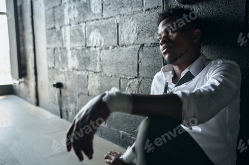 Preview: Man in depression sitting in the room
