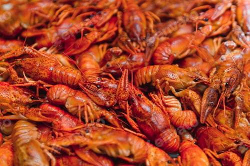 Preview: boiled crayfish on an iron plate. boiled red crayfish background for menu. top view