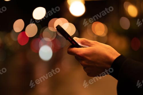 Preview: Close up of Hands with smartphone