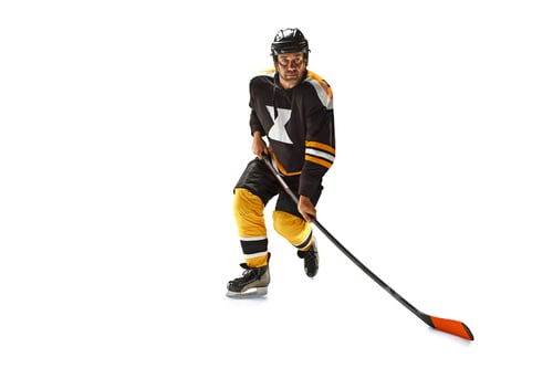 Preview: one caucasian man hockey player in studio silhouette isolated on white background