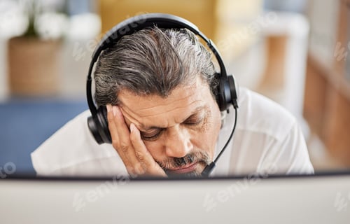 Preview: Exhausted, customer service and male consultant sleeping in his office doing an online consultation