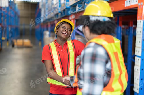 Preview: Diverse Worker working in warehouse rest on break time relax talking funny story and laughing