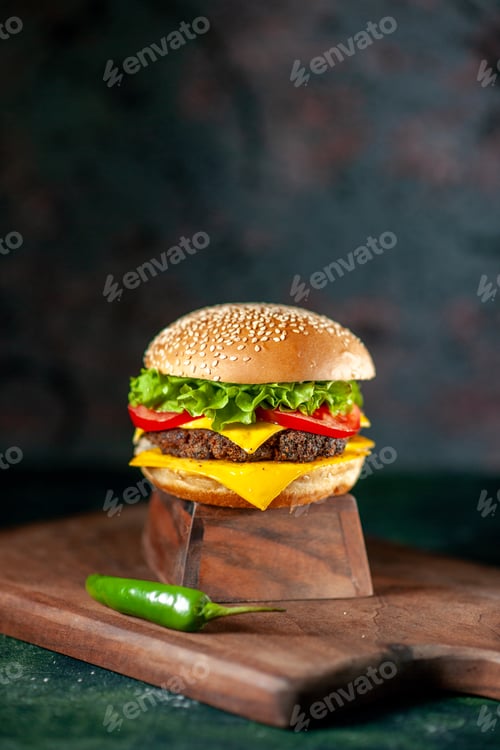 Preview: front view delicious cheeseburger on dark background color meal kfc fast-food french fries sandwich