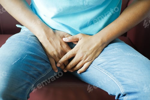 Preview: the concept of prostate and bladder problem, crotch pain of a young person