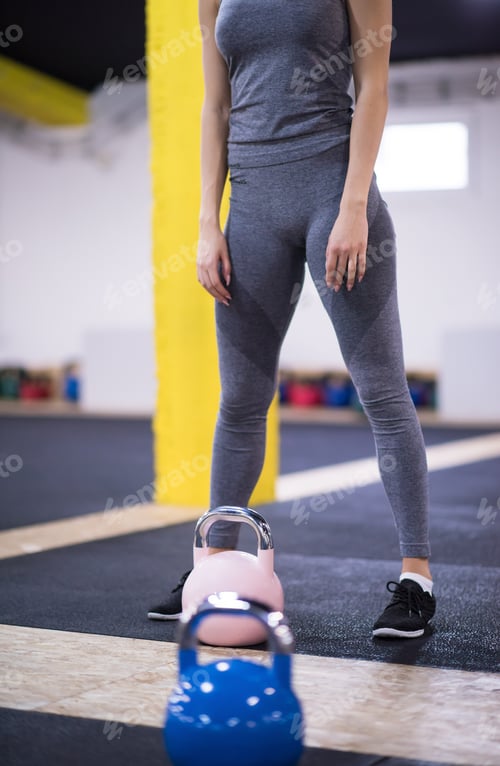 Preview: woman exercise with fitness kettlebell