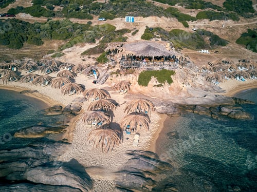 Preview: Man In Bar On A Beautiful Beach Aerial View Drone Shot, Sithonia, Greece