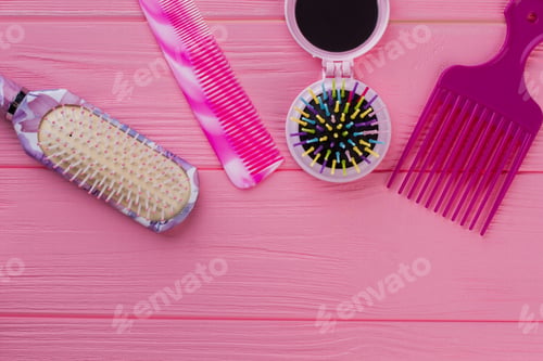 Preview: Female combs and brushes on color background.