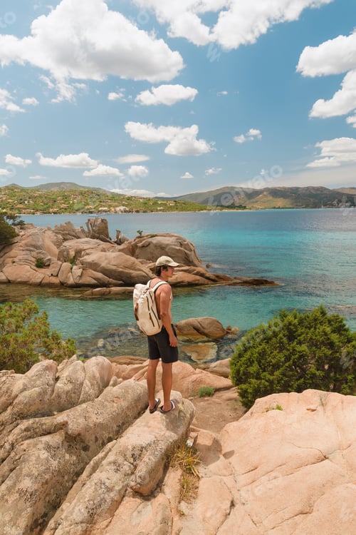 Preview: Tourist admiring the sardinian coast on summer holidays