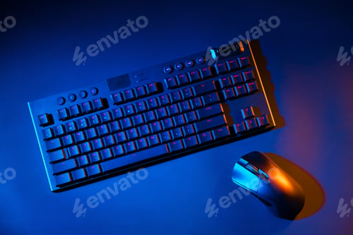 Preview: Computer keyboard and mouse on black background