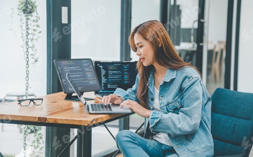 Preview: Female programmer working on coding, software development and web design