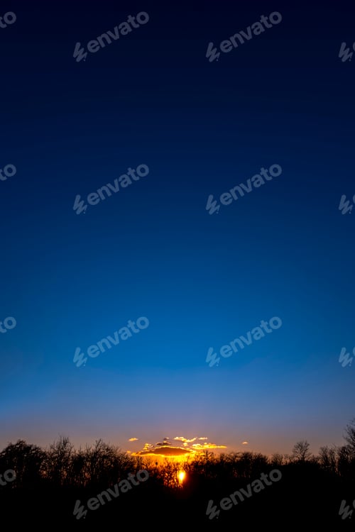 Preview: Sky clouds sunset nature background. Stunning view of golden clouds and gradient blue sky